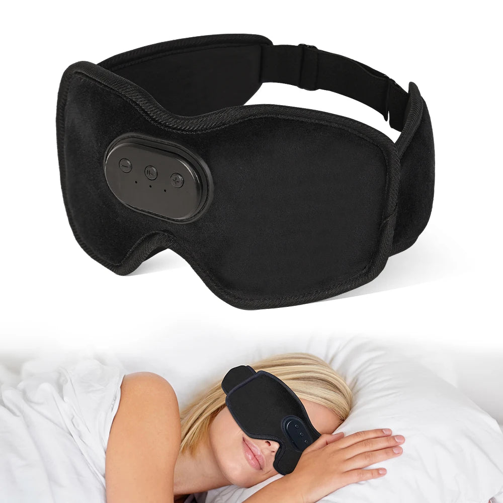 A black sleep headphone is shown resting on a white pillow next to a person's face.