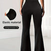 A model wearing black compression fit elastic material maxi pants.