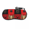 A black and red fabric pouch designed to hold a pair of spider web eyeglasses.