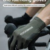 Close-up of olive green cycling riding gloves being worn on a hand, ready for use.