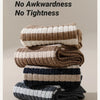 Stack of high elasticity striped men's socks in beige, brown, and gray tones.