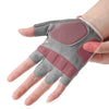 A hand wearing a gray and maroon half-finger sports glove for weight lifting.