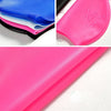 Close-up view of a bright pink waterproof silicone swimming cap in various angles.