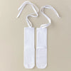 Pair of white silicone anti-slip yoga socks with white ties