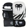A pair of black and white thickened PU boxing gloves for MMA and Muay Thai training.