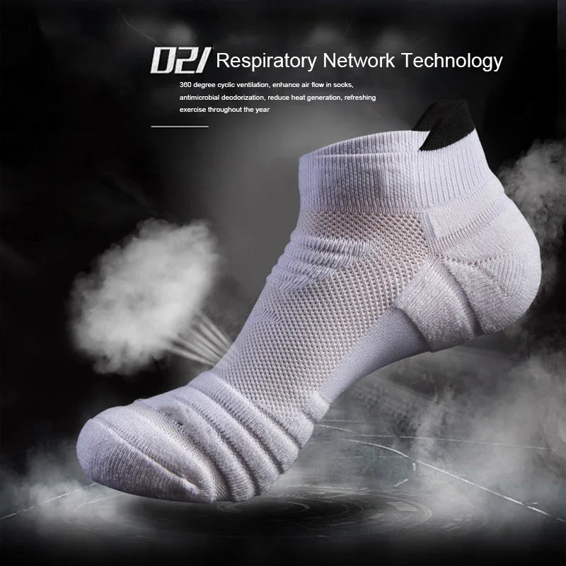 White athletic ankle socks shown in a close-up, emphasizing the knit texture and performance technology.