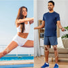 A woman is performing a leg exercise while wearing pre-cut kinesiology support tape on her leg.