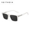 Clear frame sunglasses with dark lenses shown against a white background.