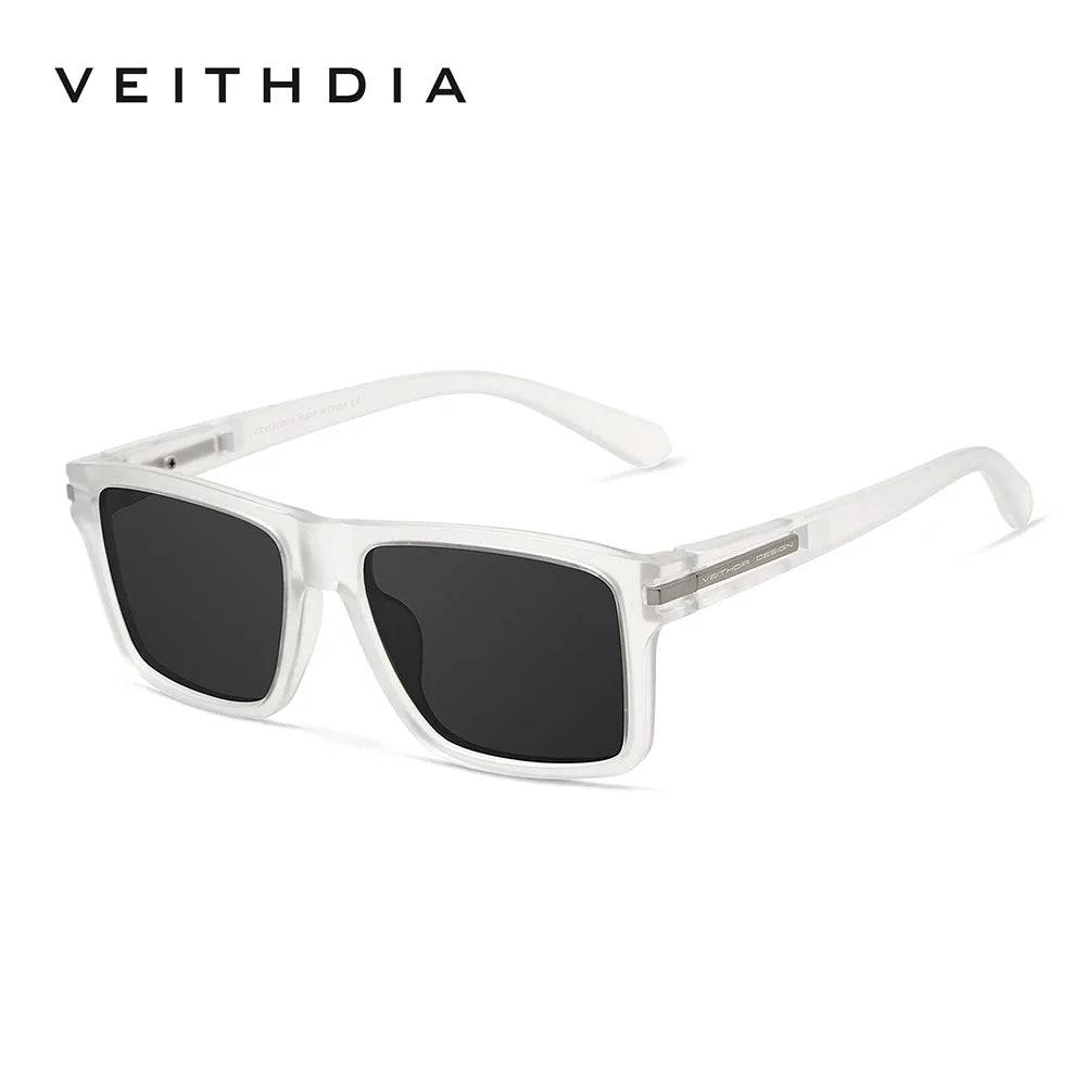 Clear frame sunglasses with dark lenses shown against a white background.