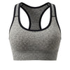 Gray seamless racerback sports bra top with black trim