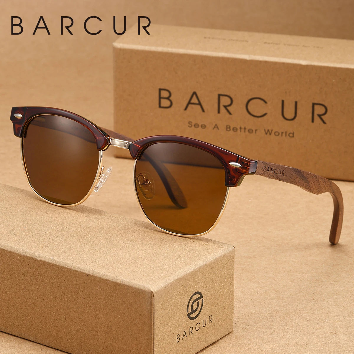 Un par de gafas de acetate marrones con detalles dorados sobre una caja de cartón.