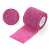Roll of pink self-adhesive elastic bandage tape with a circular view of the textured material