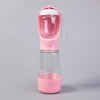 A pink 3-in-1 portable pet water and food dispenser with a clear container and a silicone lid.