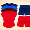 A set of seamless high-waist yoga wear for women in red, blue, and navy colors.