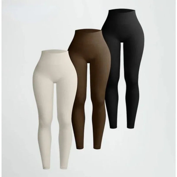 Tres pares de leggings de yoga de punto sin costuras en beige, marrón y negro mostrados verticalmente.