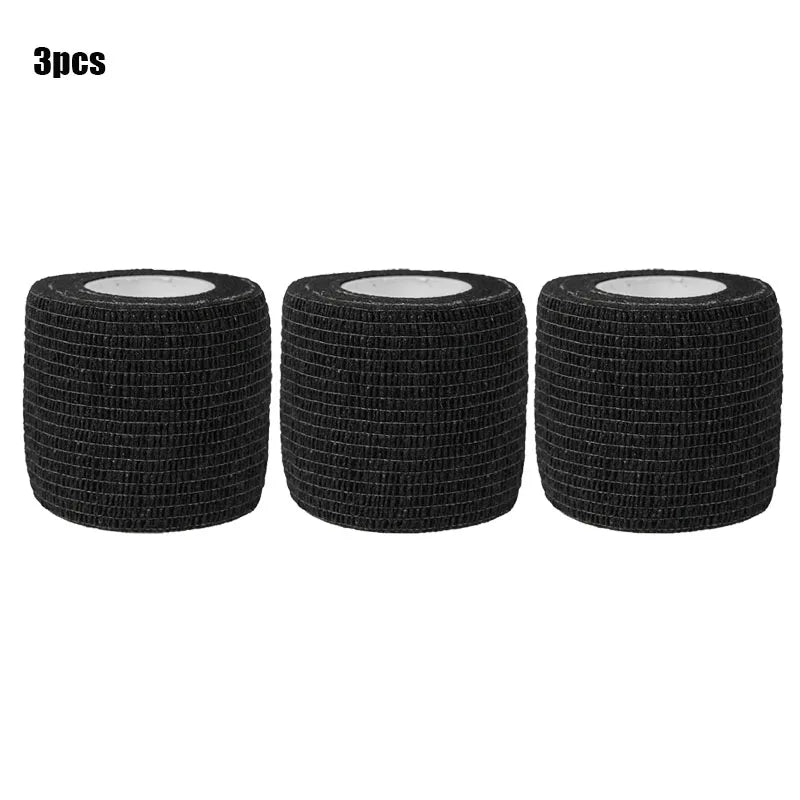 Three black elastic adhesive bandages are shown side by side.