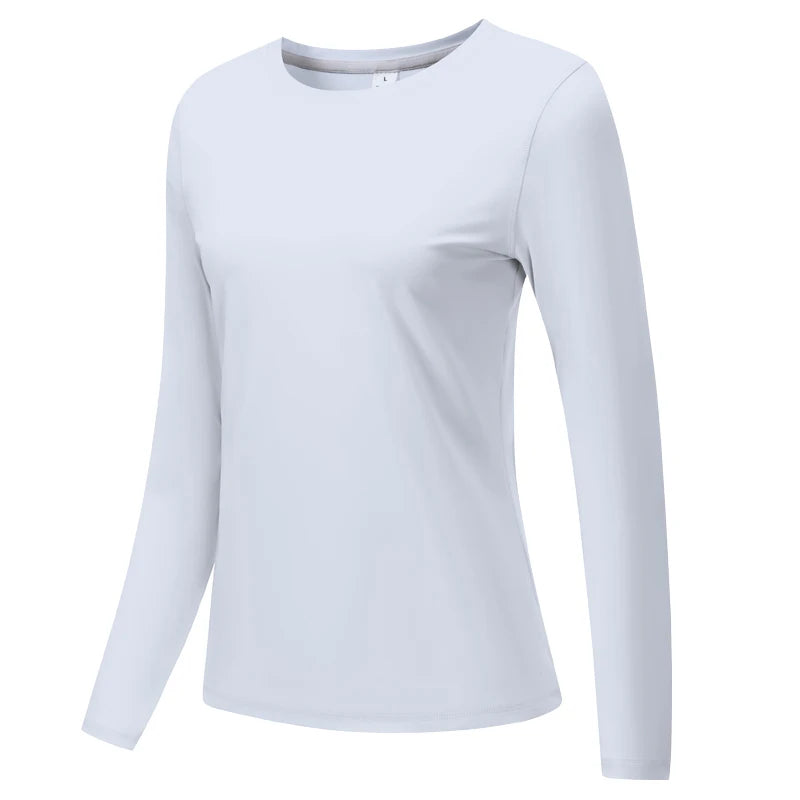 Top de yoga y running blanco, ligero y transpirable, de manga larga.
