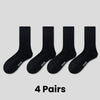 Four pairs of black breathable sports performance socks displayed individually.