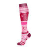A pink compression sock with a heart design, shown vertically.