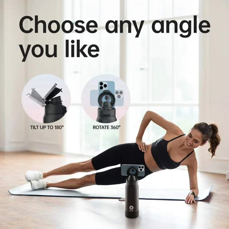 A woman performs a yoga pose on a mat with an insulated stainless steel water bottle in front of her.