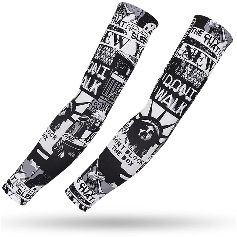 A pair of black and white patterned sports arm sleeves for UV protection