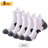 Five pairs of white men's performance running and sport socks displayed on a white background.