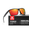 A pair of black-framed sunglasses with orange lenses resting on a box labeled KDEAM Eyewear Lunettes Lentes