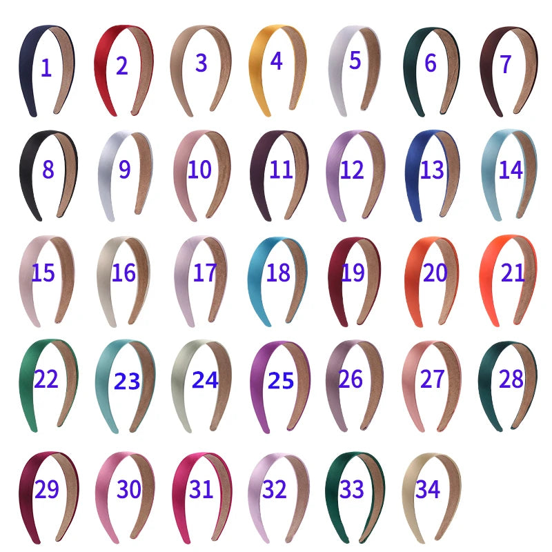 A grid of 34 solid satin hair bands for girls shown in various colors and angles.