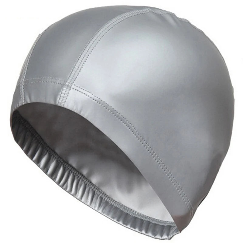 A silver waterproof swim cap for long hair protection shown from the side.