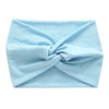 Light blue women's elastic sports headband tied in a knot