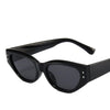 Black Y2K cat eye rhinestone sunglasses with a black frame and dark lenses