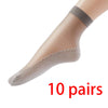 A pair of beige ultra-thin breathable ankle socks shown on a foot and leg.