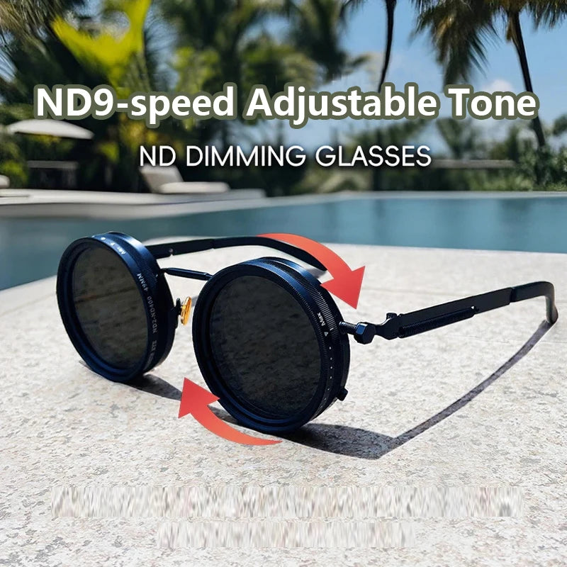ND9-speed adjustable tone ND dimming glasses resting on a concrete surface near a swimming pool.