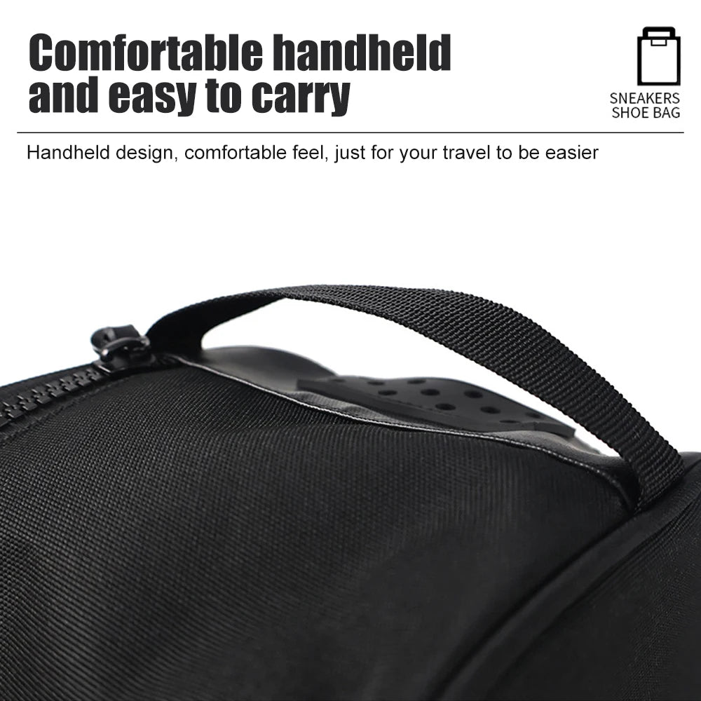 Close-up of a black waterproof sports shoe carrier bag with a padded handle.