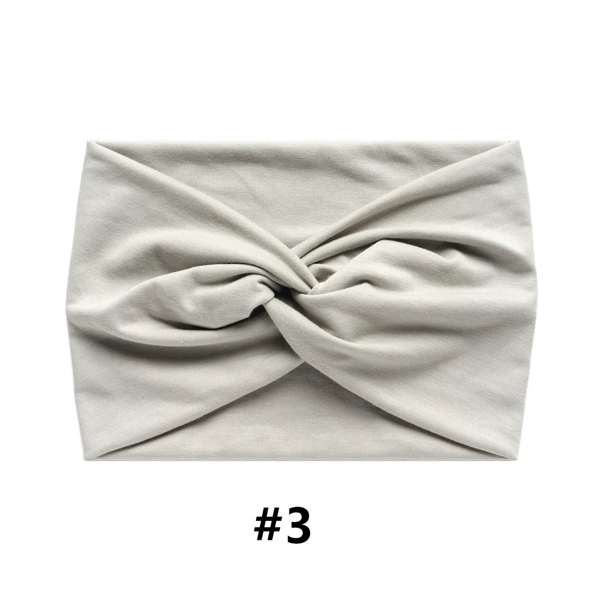 A light gray fabric headband tied in a knot, shown flat lay.
