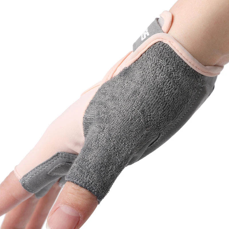 A hand wearing a gray half-finger sports glove for weight lifting and exercise.