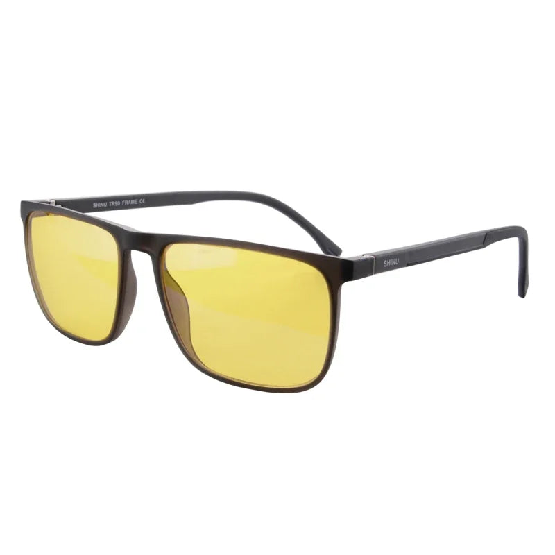 A pair of black sunglasses with yellow lenses and a black frame.