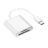 قارئ بطاقة عالمي أبيض من نوع Type-C مع كابل موصل بقرص فلاش USB.