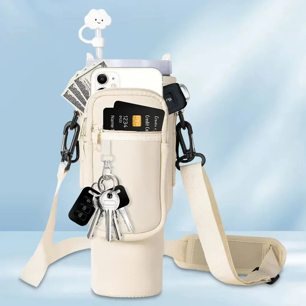 A beige neoprene water bottle carrier bag with a shoulder strap and various keys is shown against a light blue background.