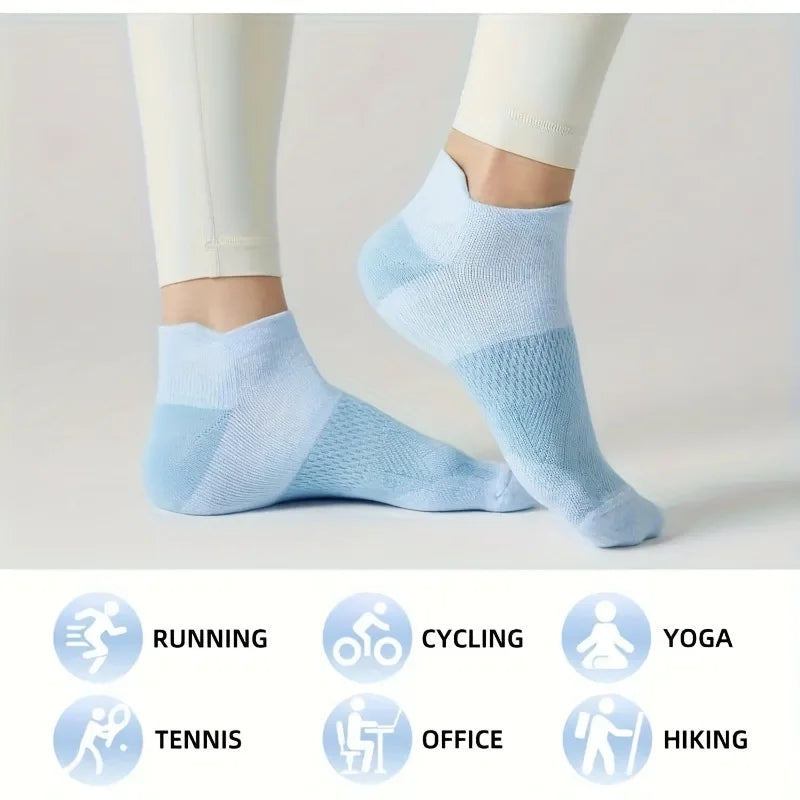 Light blue performance compression ankle socks shown on a foot, with icons indicating uses like running, cycling, yoga, tenni