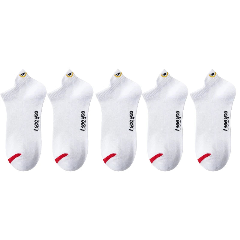 A set of five white ankle boat socks with the text I see you printed on them.