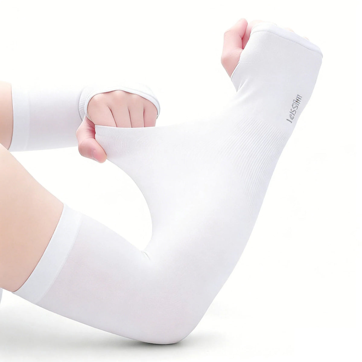 White compression arm sleeves worn on an arm, demonstrating sun and UV protection.