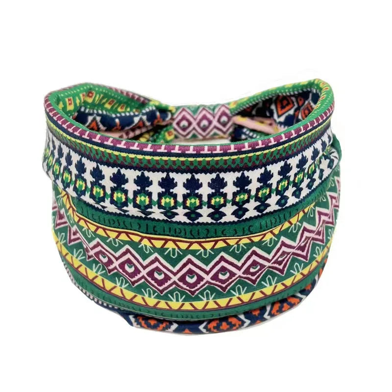 A colorful bohemian stretch cotton headband with intricate geometric patterns.