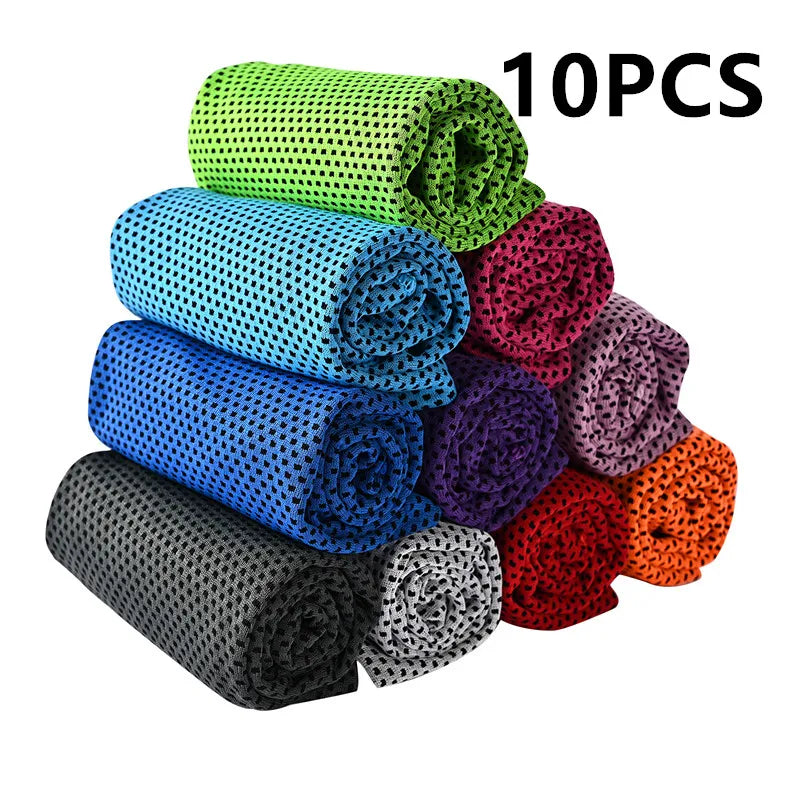 Ten rolled microfiber cooling towels in various colors stacked together.