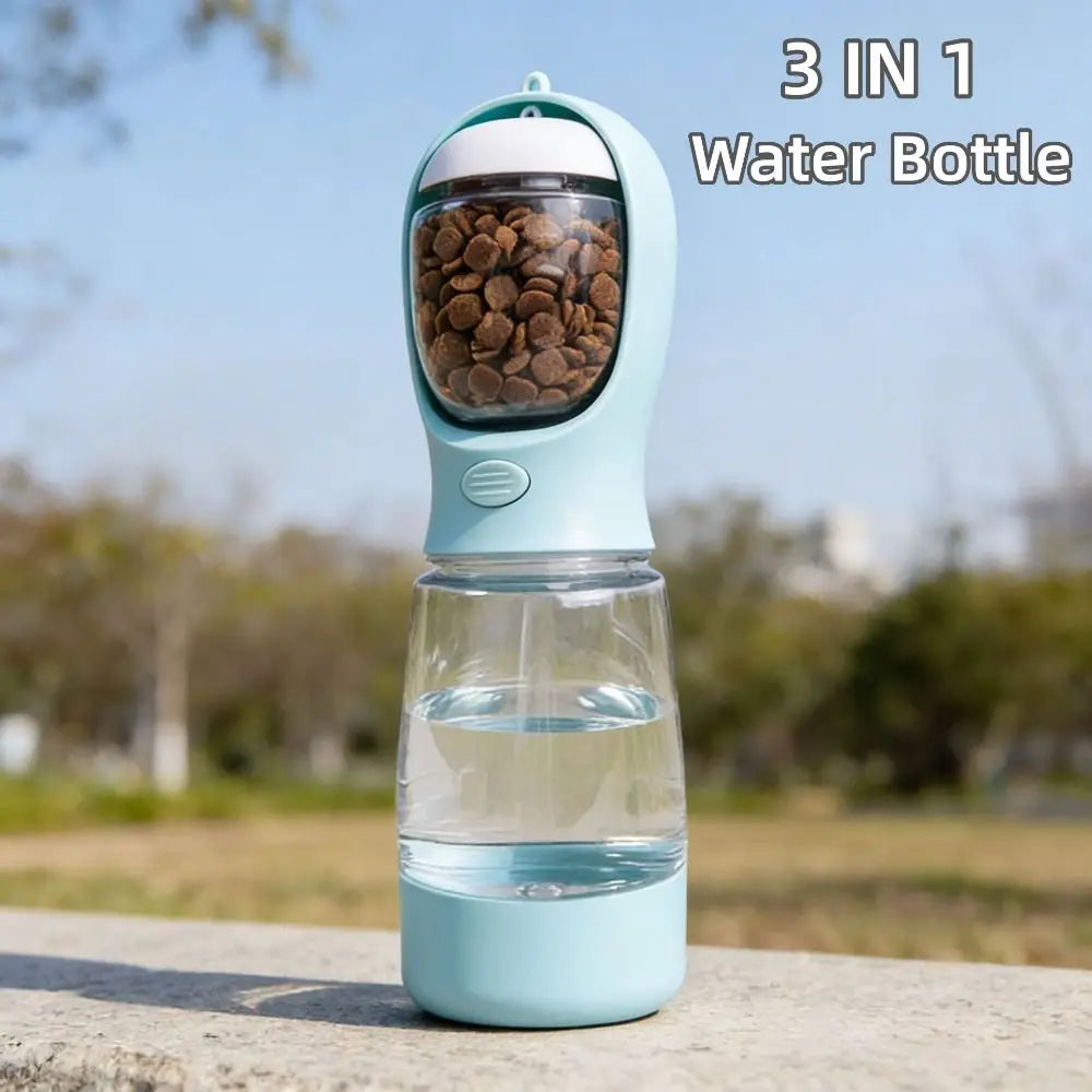 A light blue 3-in-1 water bottle dispenser with a clear body and a top section for pet food.