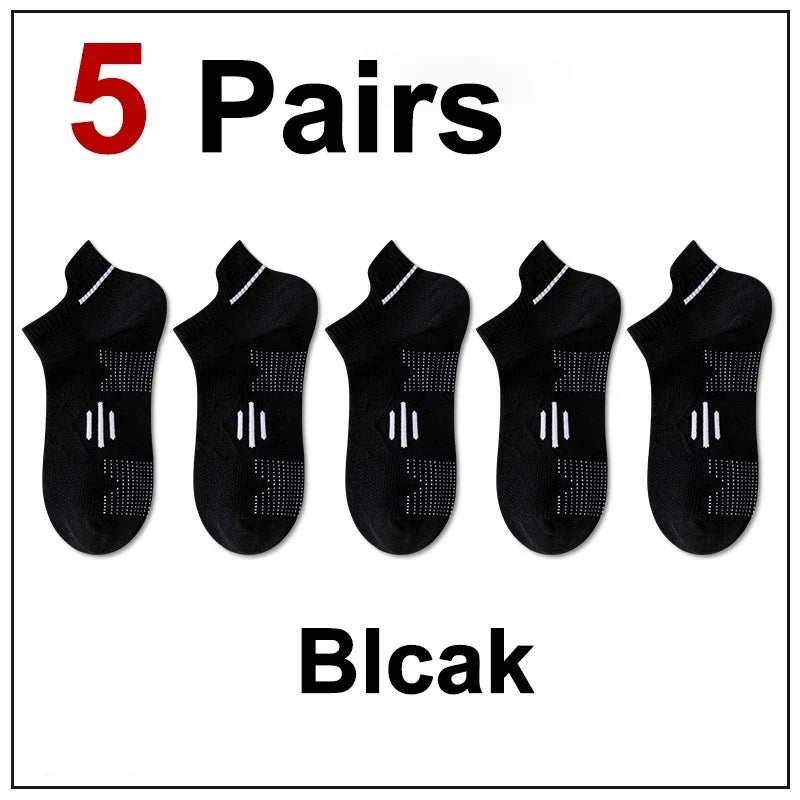 Five pairs of black athletic socks are displayed for sale.