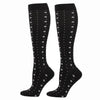 Black compression elastic socks with a white diamond pattern