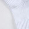 Close-up of white men's athletic soccer socks with a textured, ribbed design.