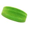 A bright lime green moisture-wicking athletic headband rolled into a cylinder.