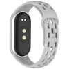A silver smart watch band replacement with a black display and a flexible TPU strap.